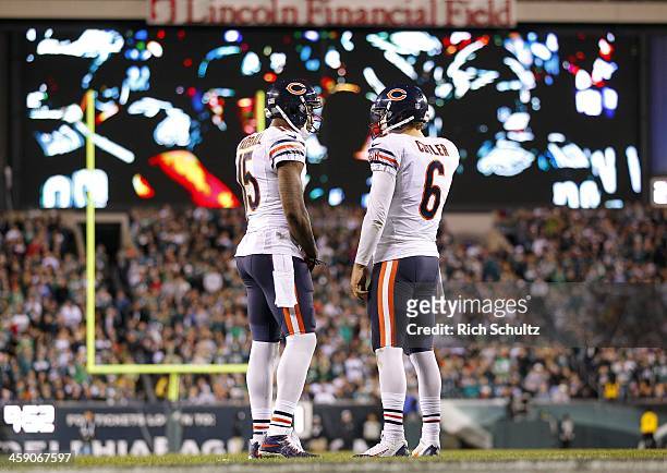 Wide receiver Brandon Marshall and quarterback Jay Cutler of the Chicago Bears talk during a timeout in the fourth quarter against the Philadelphia...