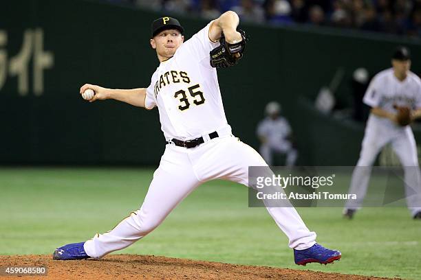 Mark Melancon of the Pittsburgh Pirates pitches in the ninth inning during the game four of Samurai Japan and MLB All Stars at Tokyo Dome on November...