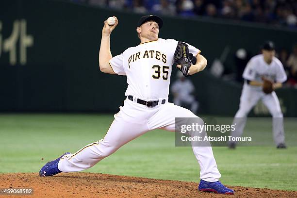 Mark Melancon of the Pittsburgh Pirates pitches in the ninth inning during the game four of Samurai Japan and MLB All Stars at Tokyo Dome on November...