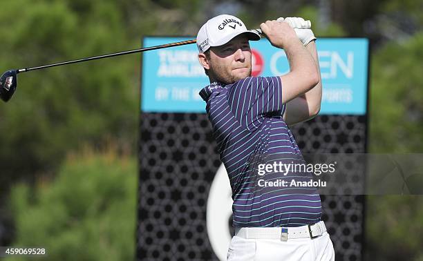 Branden Grace of England plays a shot during the 4th day of the Turkish Airlines Open 2014 at the Montgomerie Maxx Royal on November 16, 2014 in...