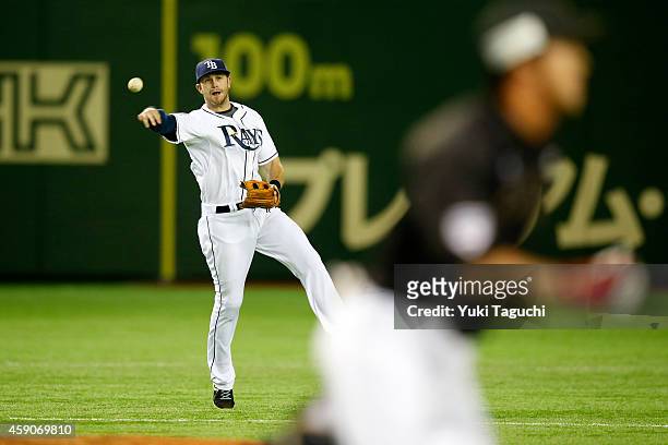 Evan Longoria of the Tampa Bay Rays throws to first base during the game against the Samurai Japan at the Tokyo Dome during the Japan All-Star Series...