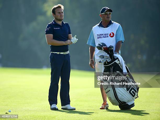 Tyrrelll Hatton of England with his caddy Kyle Roadley during the final round of the 2014 Turkish Airlines Open at The Montgomerie Maxx Royal on...