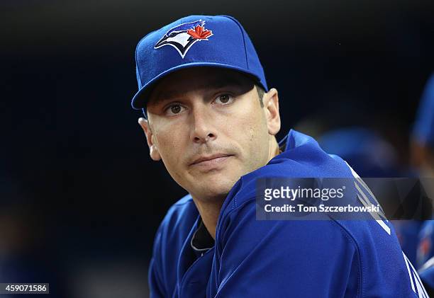 George Kottaras of the Toronto Blue Jays looks on from the dugout during MLB game action against the Tampa Bay Rays on September 13, 2014 at Rogers...