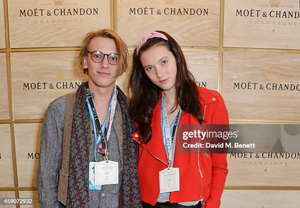 Jamie Campbell Bower and Matilda Lowther toast with Moet & Chandon, the champagne of celebration and tennis, to the winner of the 2014 Barclays ATP...