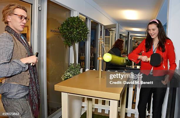 Jamie Campbell Bower and Matilda Lowther toast with Moet & Chandon, the champagne of celebration and tennis, to the winner of the 2014 Barclays ATP...