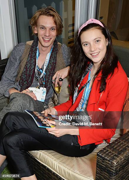 Jamie Campbell Bower and Matilda Lowther toast with Moet & Chandon, the champagne of celebration and tennis, to the winner of the 2014 Barclays ATP...