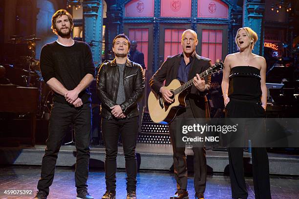 Woody Harrelson" Episode 1668 -- Pictured: Liam Hemsworth, Josh Hutcherson, Woody Harrelson and Jennifer Lawrence sing during the monologue on...
