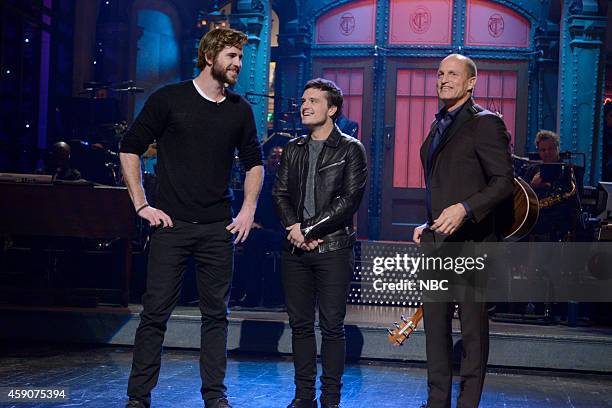 Woody Harrelson" Episode 1668 -- Pictured: Liam Hemsworth, Josh Hutcherson and Woody Harrelson during the monologue on November 15, 2014 --