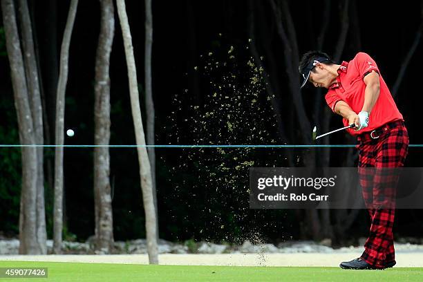 Danny Lee of New Zealand hits his second shot on the 9h hole during the final round of the OHL Classic at the Mayakoba El Camaleon Golf Club on...