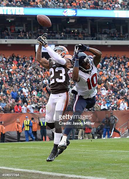 Joe Haden of the Cleveland Browns breaks up and intercepts a pass intended for DeAndre Hopkins of the Houston Texans during the first quarter at...