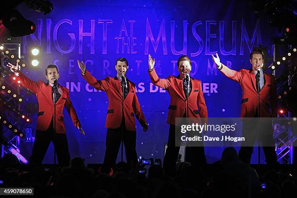 Cast from 'The Jersey Boys' perform as the Regent Street Christmas Lights are switched on by Take That at Regent Street on November 16, 2014 in...