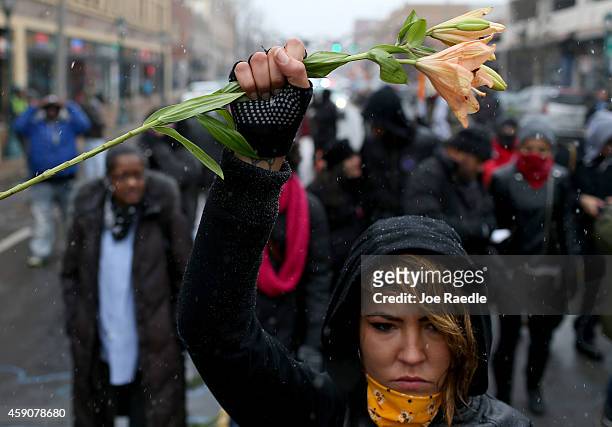 Demonstrators march through the streets as people await a grand jury decision on November 16, 2014 in St. Louis, Missouri. The area around St Louis,...