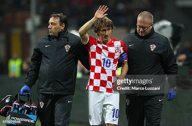 Luka Modric of Croatia walks off with an injury during the EURO 2016 Group H Qualifier match between Italy and Croatia at Stadio Giuseppe Meazza on...