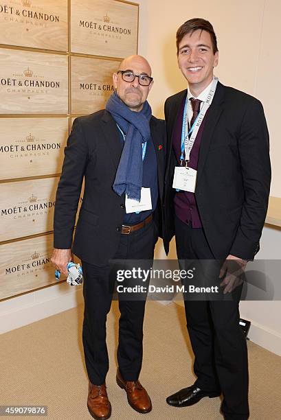 Stanley Tucci and Oliver Phelps toast with Moet & Chandon, the champagne of celebration and tennis, to the winner of the 2014 Barclays ATP World Tour...