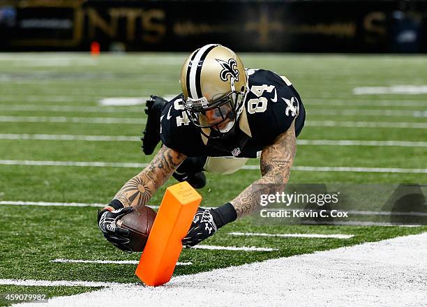 Kenny Stills of the New Orleans Saints scores a touchdown against the Cincinnati Bengals during the second half at Mercedes-Benz Superdome on...
