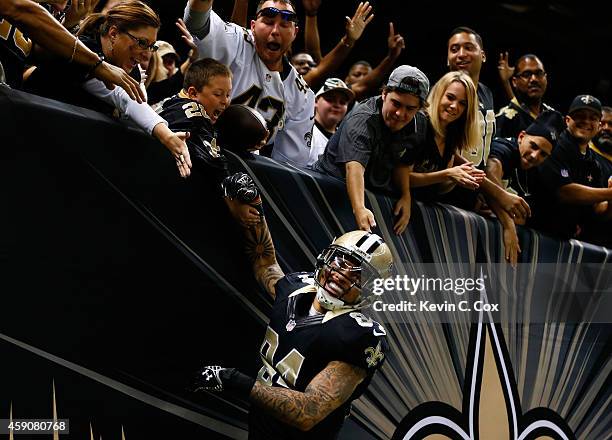 Kenny Stills of the New Orleans Saints celebrates with fans after his touchdown against the Cincinnati Bengals during the second half at...