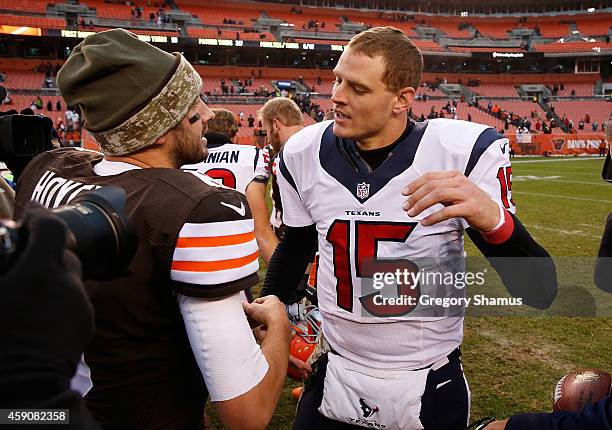 Ryan Mallett of the Houston Texans is congratulated by Brian Hoyer of the Cleveland Browns after Houston's 23-7 win at FirstEnergy Stadium on...