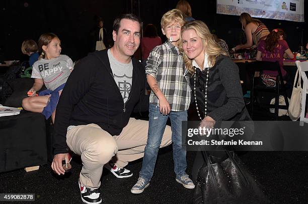 Actor Rob Riggle, George Riggle and Tiffany Riggle attend P.S. ARTS presents Express Yourself 2014 with sponsors OneWest Bank and Jaguar Land Rover...