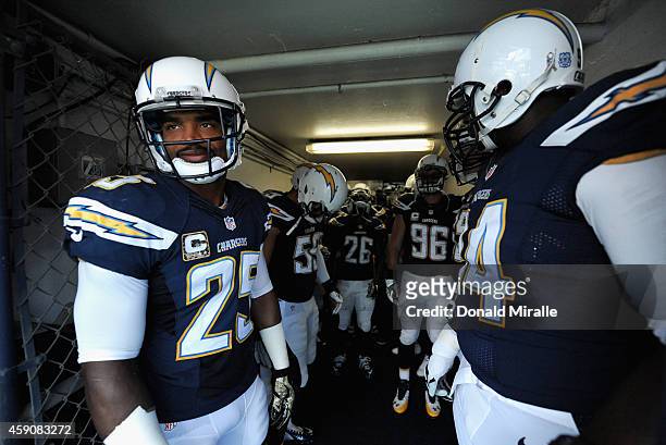 Darrell Stuckey and Corey Liuget of the San Diego Chargers wait to take the field before playing in the game against the Oakland Raiders at Qualcomm...