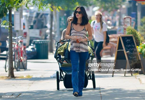 Olivia Munn on a hot day in downtown Manhattan. On September 11, 2013 in New York City.