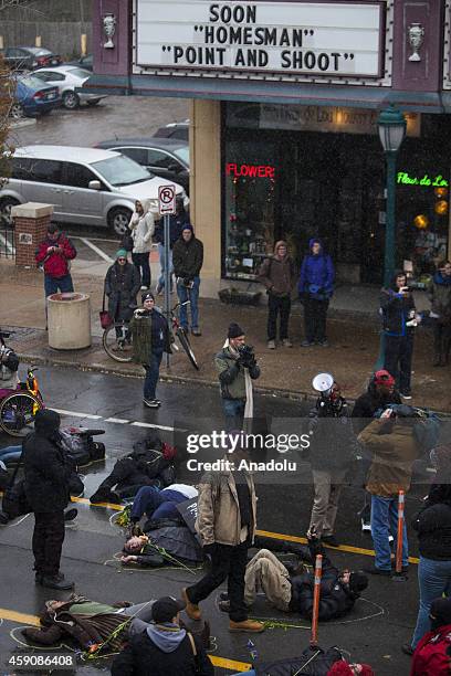 As the U.S. Town of Ferguson, Missouri, awaits a grand jury decision on whether to bring criminal charges against a police officer who killed unarmed...