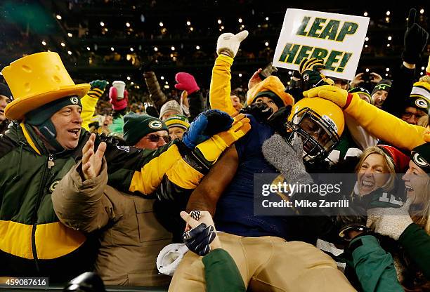 Eddie Lacy of the Green Bay Packers celebrates after scoring a touchdown against the Philadelphia Eagles during the second quarter of the game at...