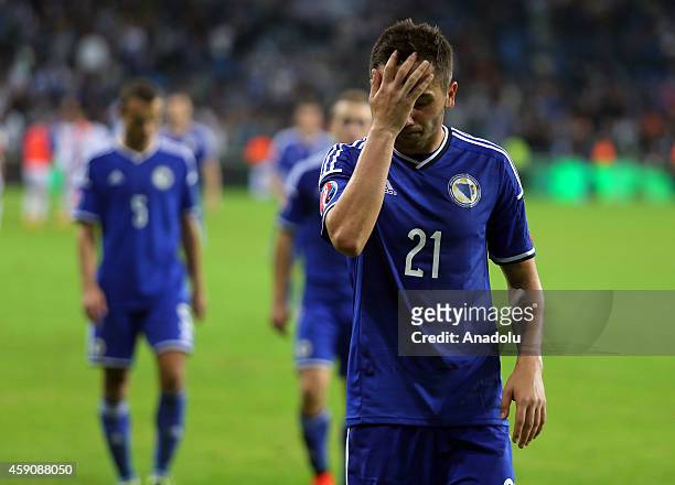 Anel Hadzic of Bosnia-Herzegovina reacts after losing to Israel in the UEFA 2016 European Championship qualifying group B football match between...