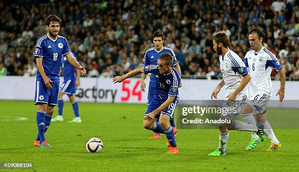 Edin Visca of Bosnia-Herzegovina in action during a UEFA 2016 European Championship qualifying group B football match between Israel and...