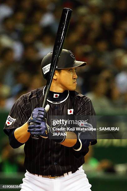 Seiichi Uchikawa of Samurai Japan bats during the game four of Samurai Japan and MLB All Stars at Tokyo Dome on November 16, 2014 in Tokyo, Japan.