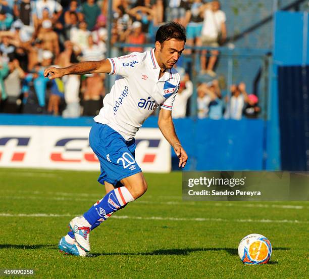 Alvaro Recoba of Nacional drives the ball during a match between Cerro and Nacional as part of round 13 of Campeonato Apertura 2014 at Gran Parque...