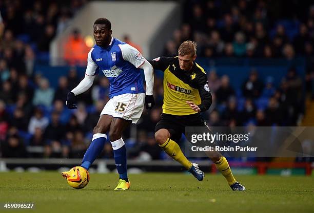 Frank Nouble of Ipswich Town is challenged by Joel Ekstrand of Watford during the Sky Bet Championship match between Ipswich Town and Watford at...