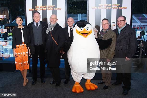 Annet Mahendru, Tom McGrath, John Malkovich, Pitbull, Eric Darnell, and Simon Smith attend the "Penguins Of Madagascar" New York Premiere at Winter...