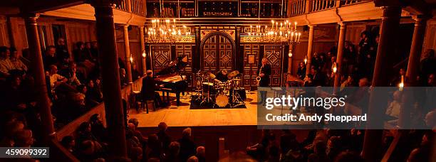 Guillaume de Chassy, Christophe Marguet and Andy Sheppard perform on stage at Sam Wanamaker Playhouse, Shakespears Globe Theatre during London Jazz...