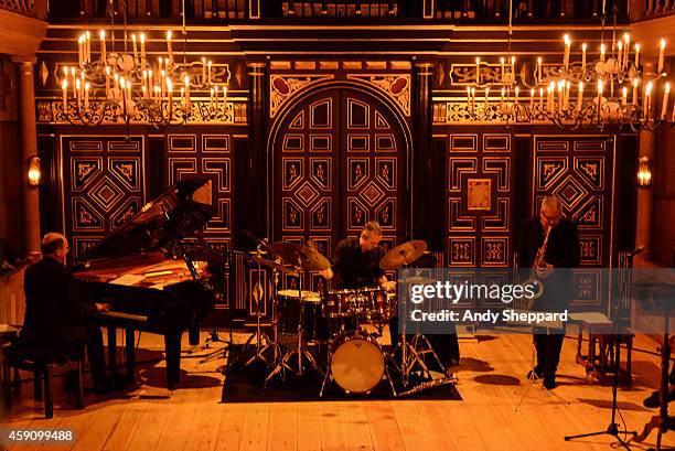 Guillaume de Chassy, Christophe Marguet and Andy Sheppard perform on stage at Sam Wanamaker Playhouse, Shakespears Globe Theatre during London Jazz...