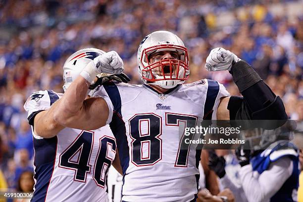 Rob Gronkowski of the New England Patriots celebrates his touchdown against the Indianapolis Colts during the fourth quarter of the game at Lucas Oil...