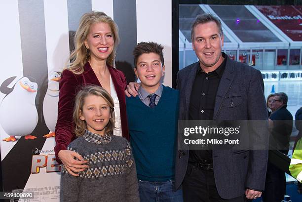 Chris Miller and family attend the "Penguins Of Madagascar" New York Premiere at Winter Village at Bryant Park Ice Rink on November 16, 2014 in New...