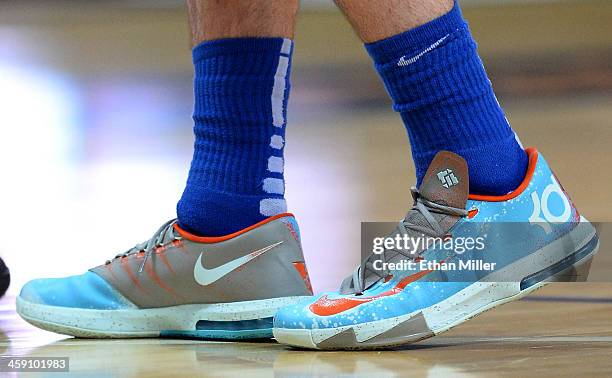 Brett Comer of the Florida Gulf Coast Eagles wears Nike sneakers during a game against the Florida A&M Rattlers in the 2013 Continental Tire Las...