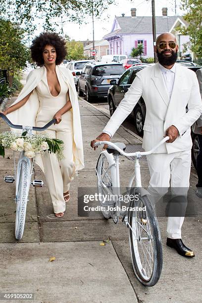 Musician Solange Knowles and her fiancee, music video director Alan Ferguson ride bicycles on the streets of the French Quarter en route to their...