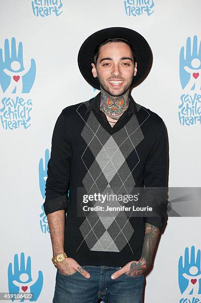 Tattoo artist Romeo Lacoste arrives at Save A Child's Heart Celebration & Honorary Ceremony at Sony Studios on November 16, 2014 in Los Angeles,...