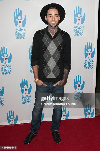 Tattoo artist Romeo Lacoste arrives at Save A Child's Heart Celebration & Honorary Ceremony at Sony Studios on November 16, 2014 in Los Angeles,...