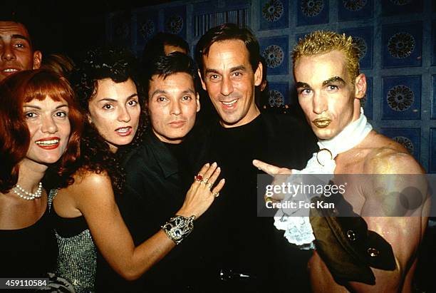 Marie France, Yana Katsoulos, Thierry Ardisson and Jean Claude Lagreze attend a fashion week Party at Les Bains Douches in the 1990s in Paris, France.