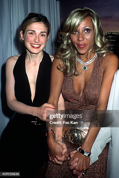 Julie Gayet and Cathy Guetta attend a Cathy Guetta Birthday Party at Les Bains Douches in the 1990s in Paris, France.