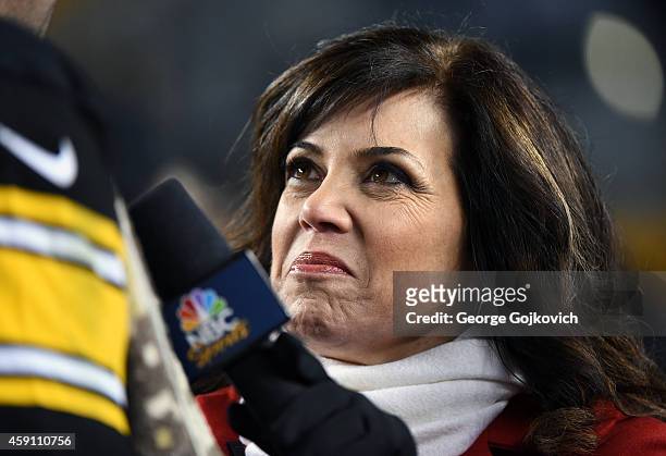 Sports Sunday Night Football sideline reporter Michele Tafoya interviews a player after a game between the Baltimore Ravens and Pittsburgh Steelers...