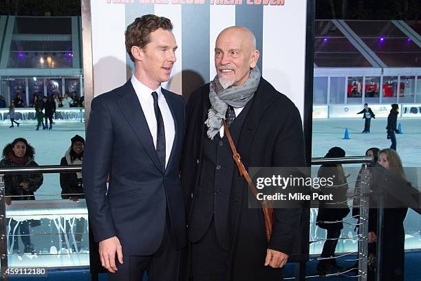 Actors Benedict Cumberbatch and John Malkovich attend the "Penguins Of Madagascar" New York Premiere at Winter Village at Bryant Park Ice Rink on...