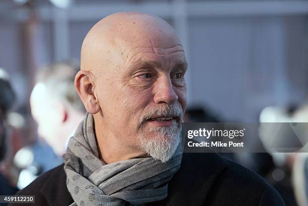 Actor John Malkovich attends the "Penguins Of Madagascar" New York Premiere at Winter Village at Bryant Park Ice Rink on November 16, 2014 in New...