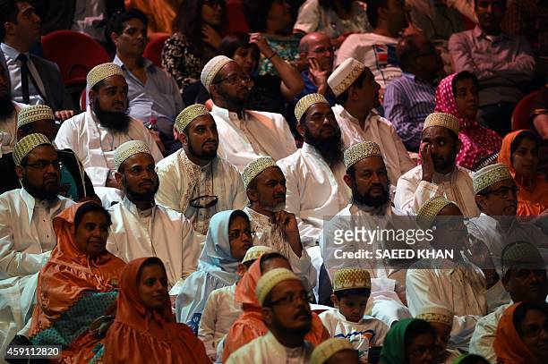 People listen to a speech by Prime Minster of India Narendra Modi at the Allphones Arena Olympic park in Sydney on November 17, 2014. Thousands of...