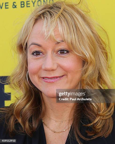 Actress Megyn Price attends the P.S. ARTS Express Yourself 2014 at Barker Hanger on November 16, 2014 in Santa Monica, California.