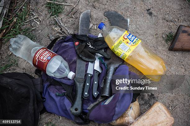 The contents of a rhino poacher's backpack on November 7, 2014 at the Kruger National Park, South Africa. The suspected rhino poachers were in...