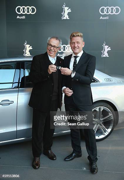 Dieter Kosslick , Director of the Berlinale International Film Festival symobolically receives a key to an Audi limousine from Wayne Griffiths,...