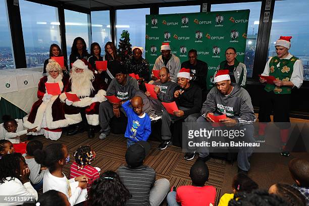 Jared Sullinger, Phil Pressey, Rajon Rondo, Marshon Brooks and Jordan Crawford of the Boston Celtics sing holiday songs and spread holiday cheer to...